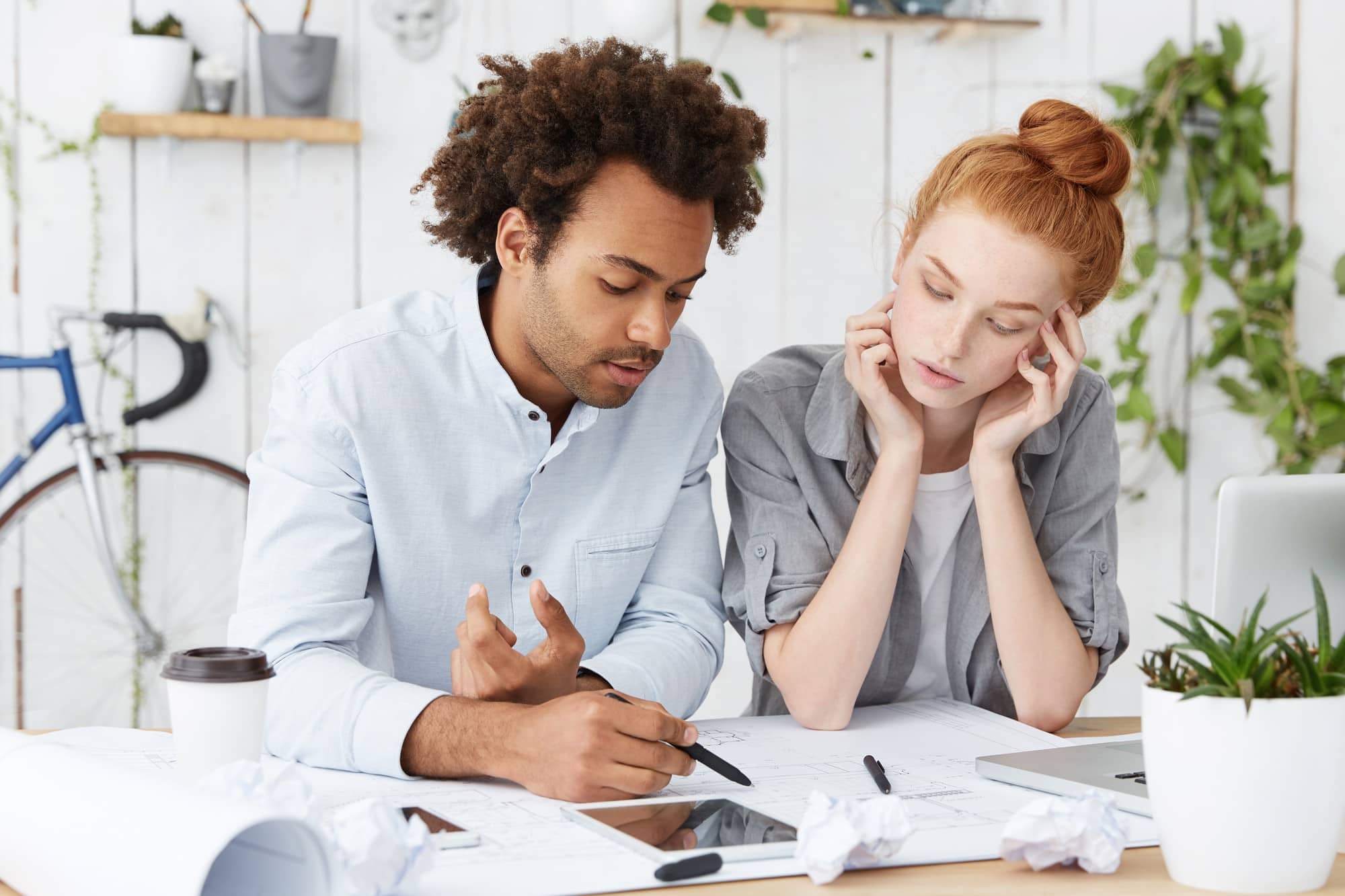 2 individuals discussing financial rehabilitation
